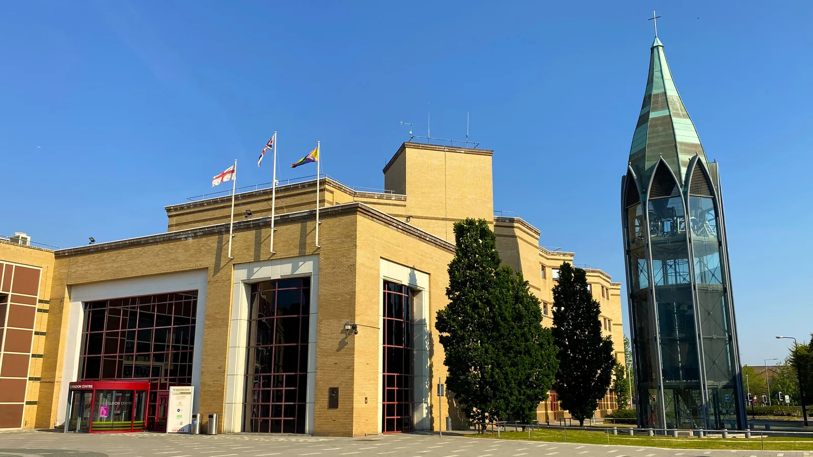 The Basildon Centre, the borough council's offices, beside the glass bell tower of St Martin's Church in Basildon town centre.