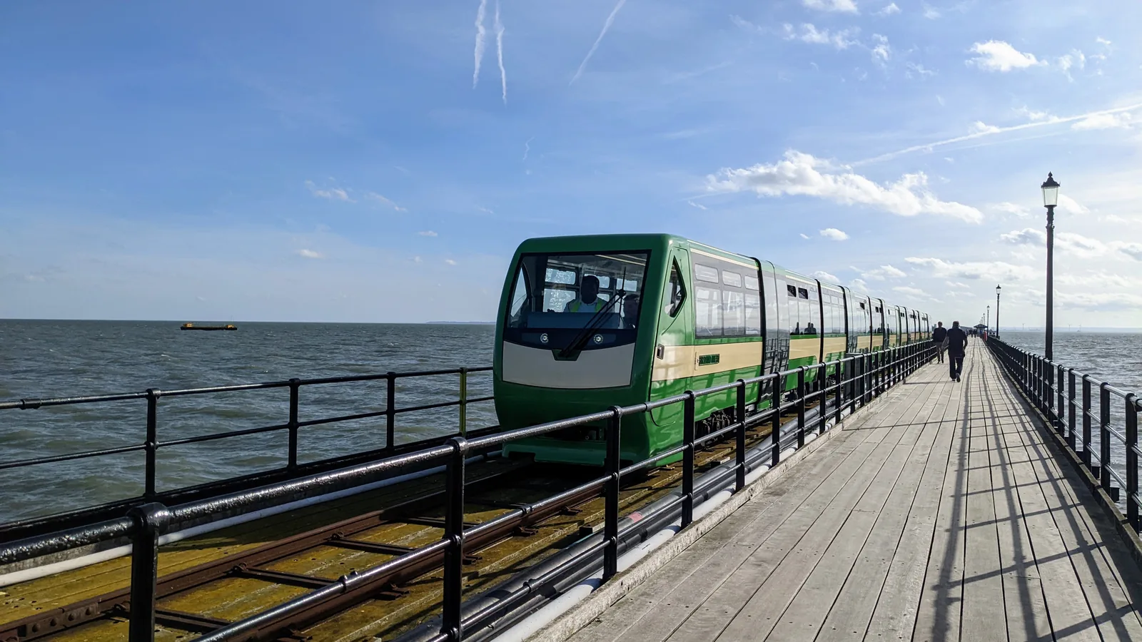 The pier train running along Southend Pier, with the Thames Estuary on either side.