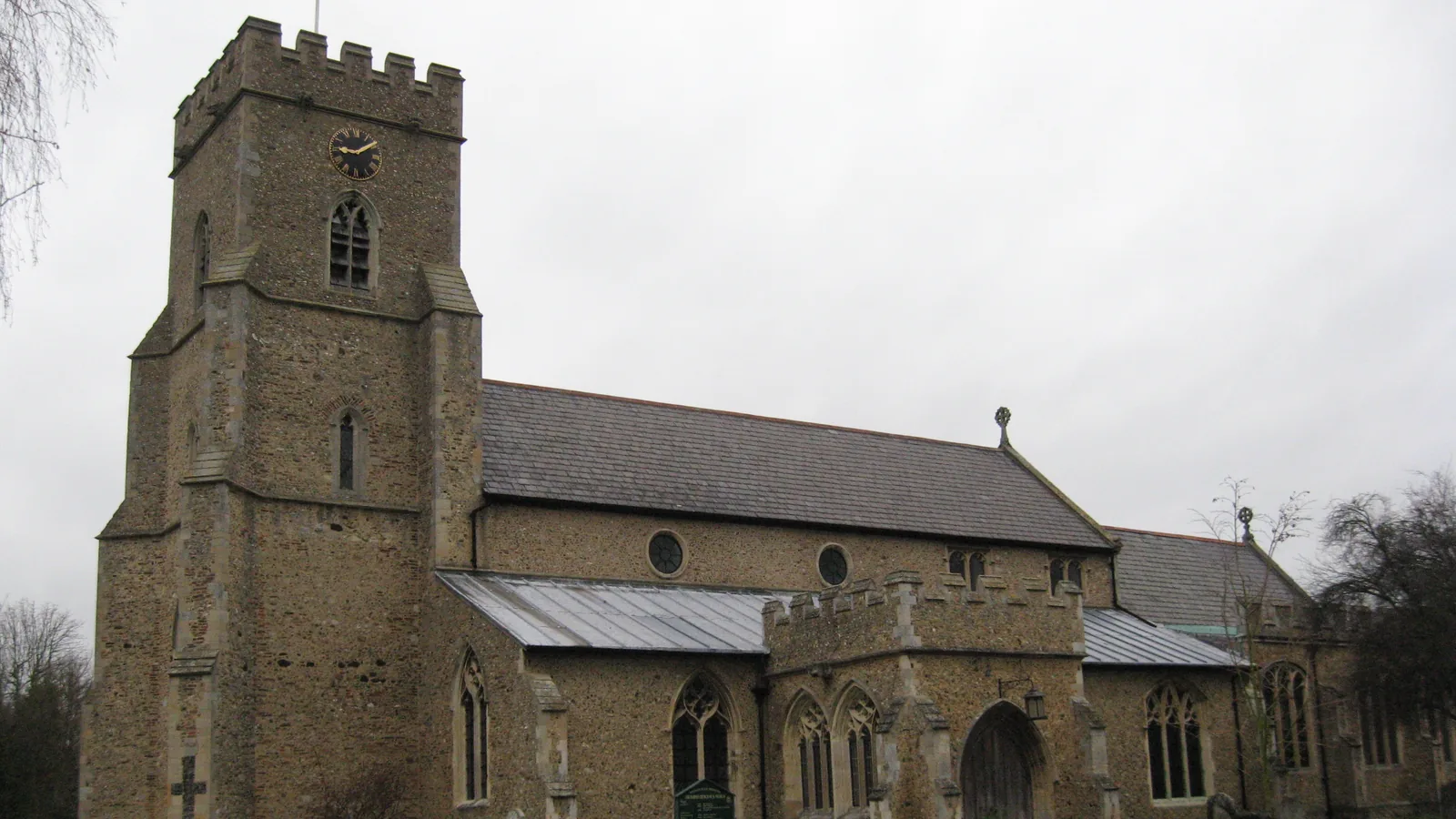 St Nicolas Church at Chipping Hill in Witham, with its flint tower and clock.